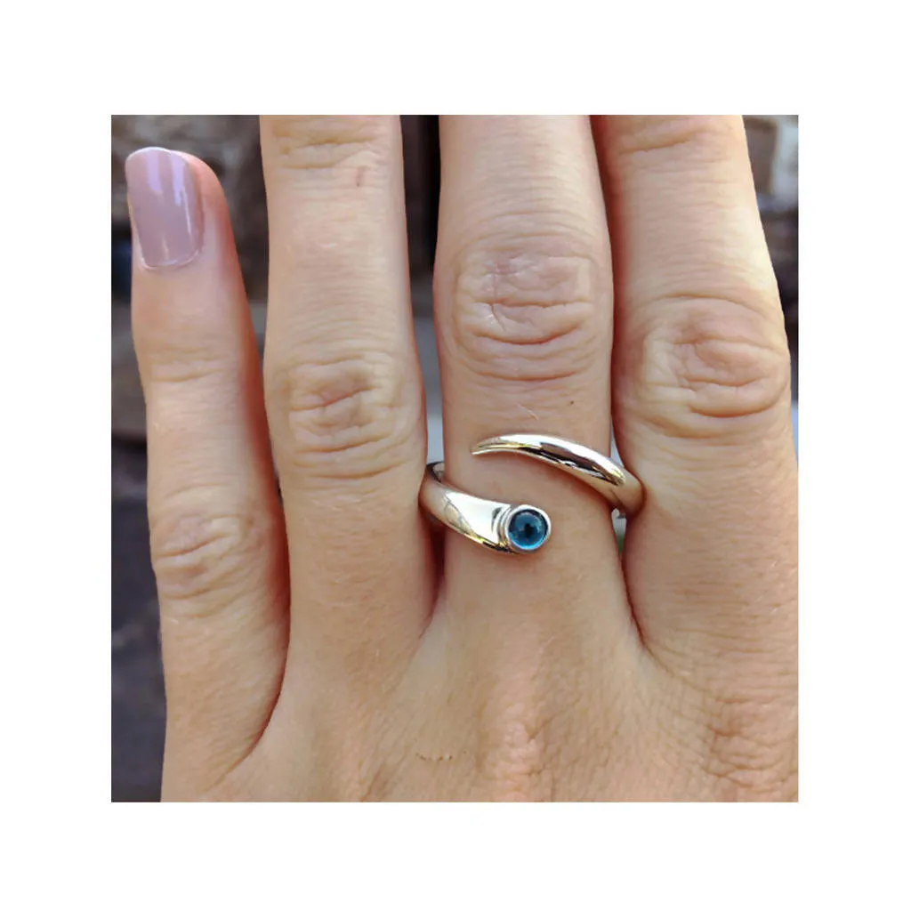 Curving Silver Wiggly Ring with Blue Topaz