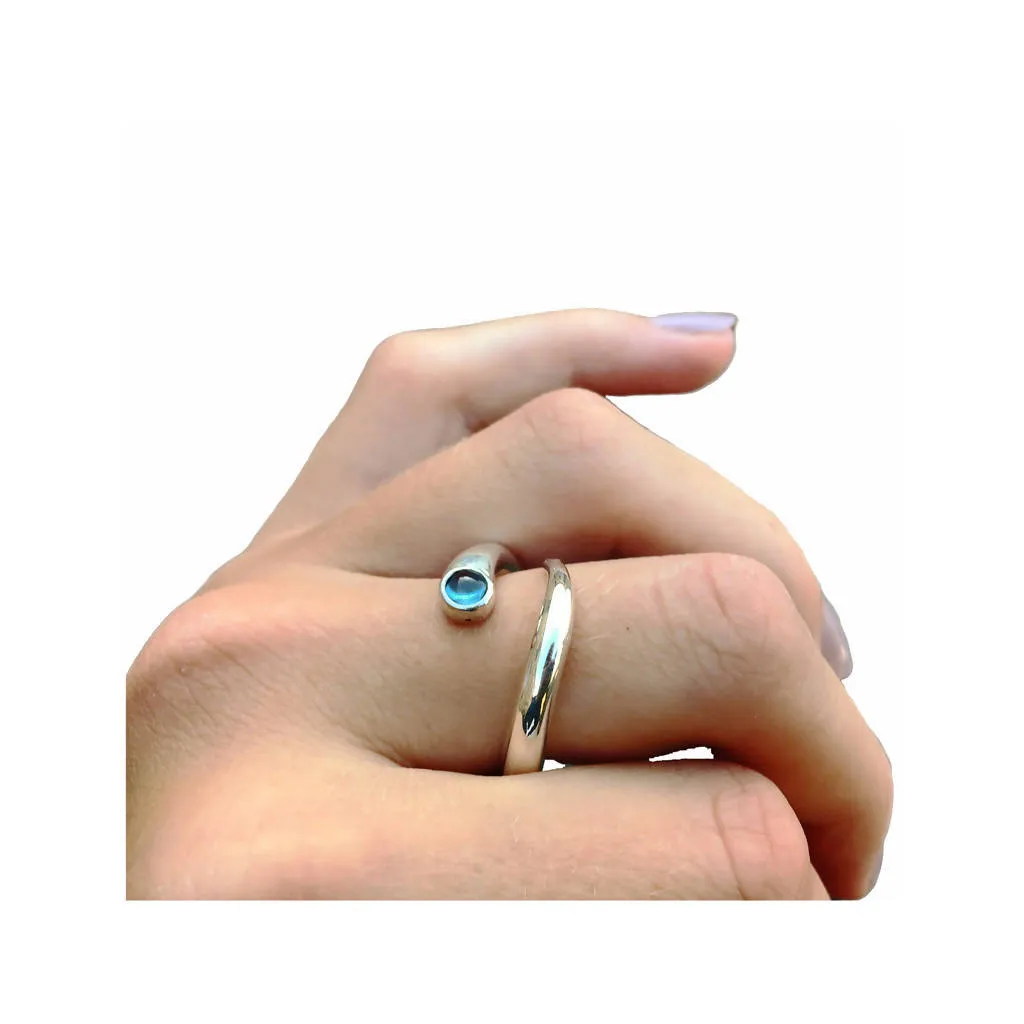 Curving Silver Wiggly Ring with Blue Topaz