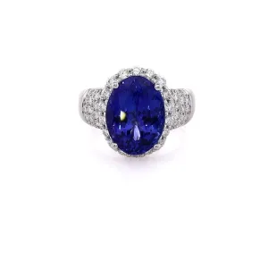 Estate 14 Karat White Gold Tanzanite Ring with Diamond Halo and Shank