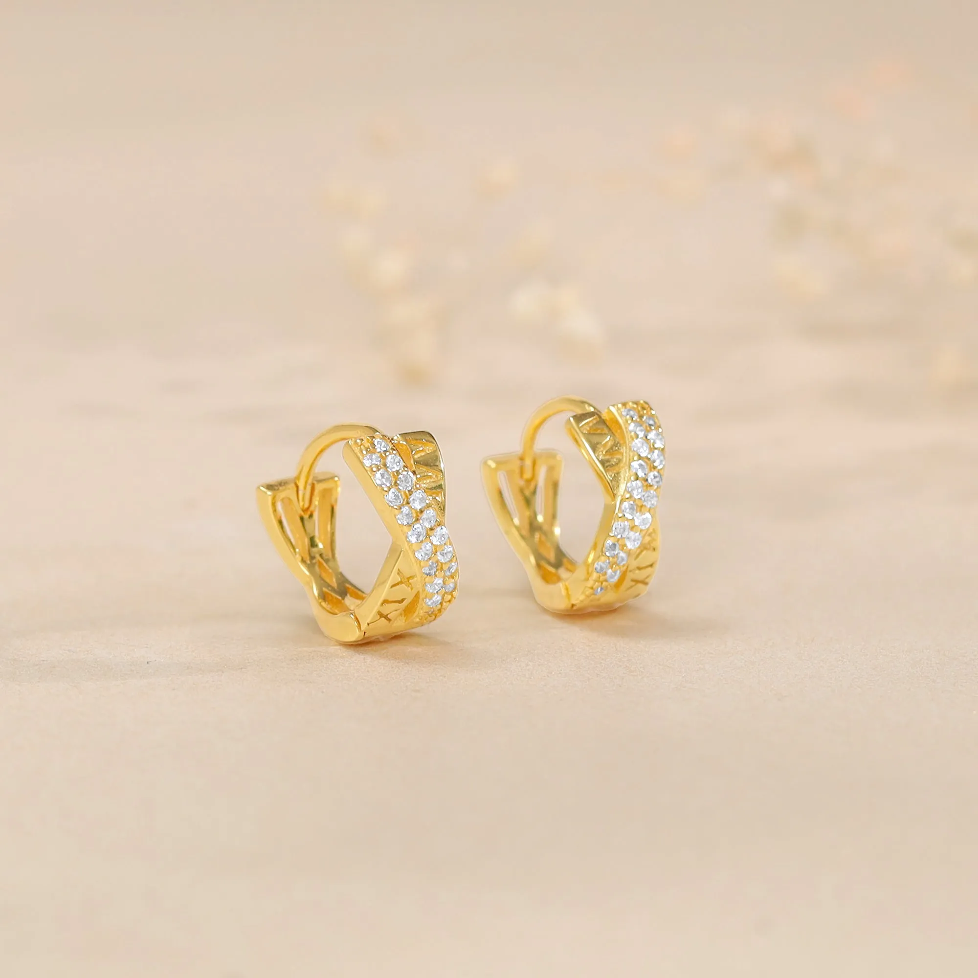 Golden Zircon Studded Twisted Huggies Earrings